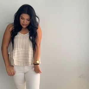 Peplum top. With adjustable straps